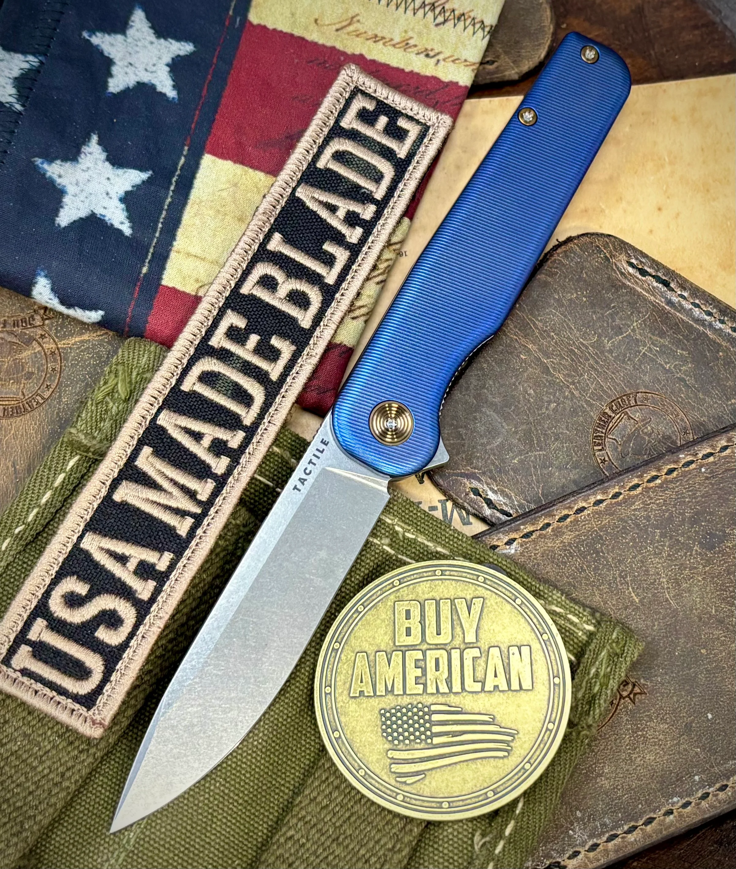 Carolina Blue Anodized Rockwall Flipper with Stonewashed Magnacut Blade Countoured Ti Handles with Ti Hardware from Tactile Knife Co.