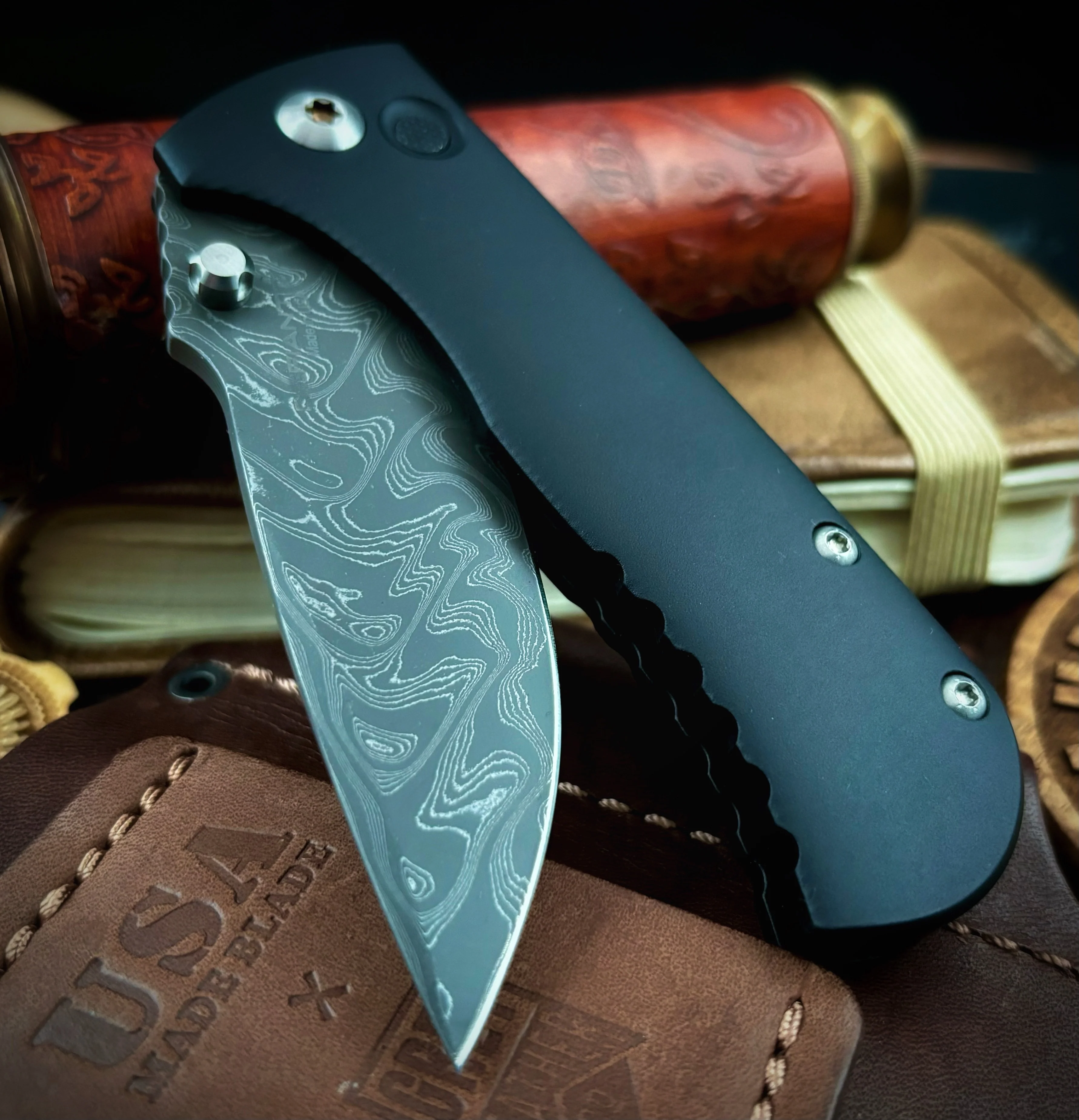Defiant-7 Talos Button Lock with Black Boomerang Stainless Chad Nichols Damascus Blade and Black Hardcoat Anodized Aluminum Handles - Image 3