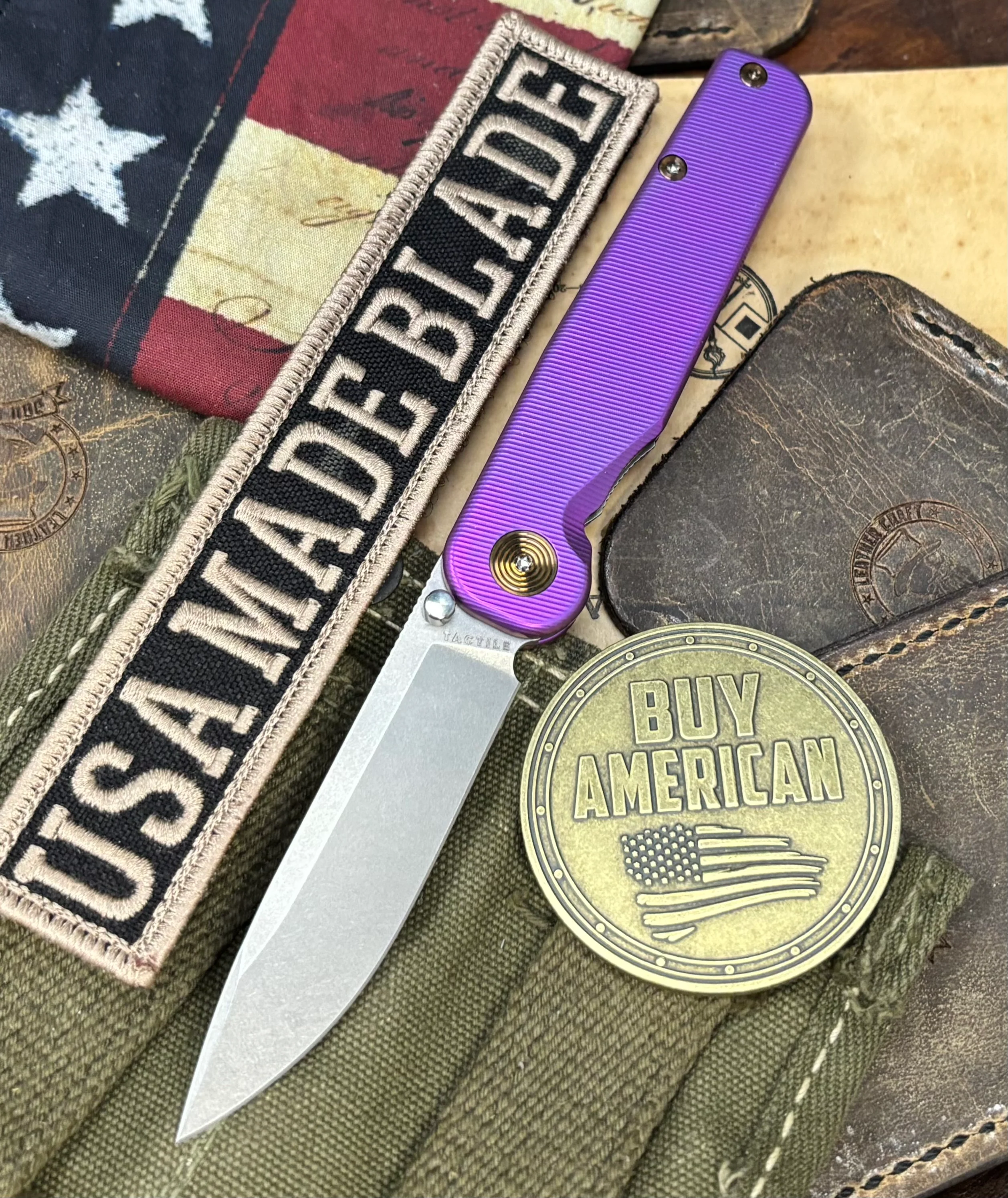 High Res Purple with Bronze Hardware Anodized Tactile Knives Rockwall Thumbstud Ti Liner Lock in Magnacut