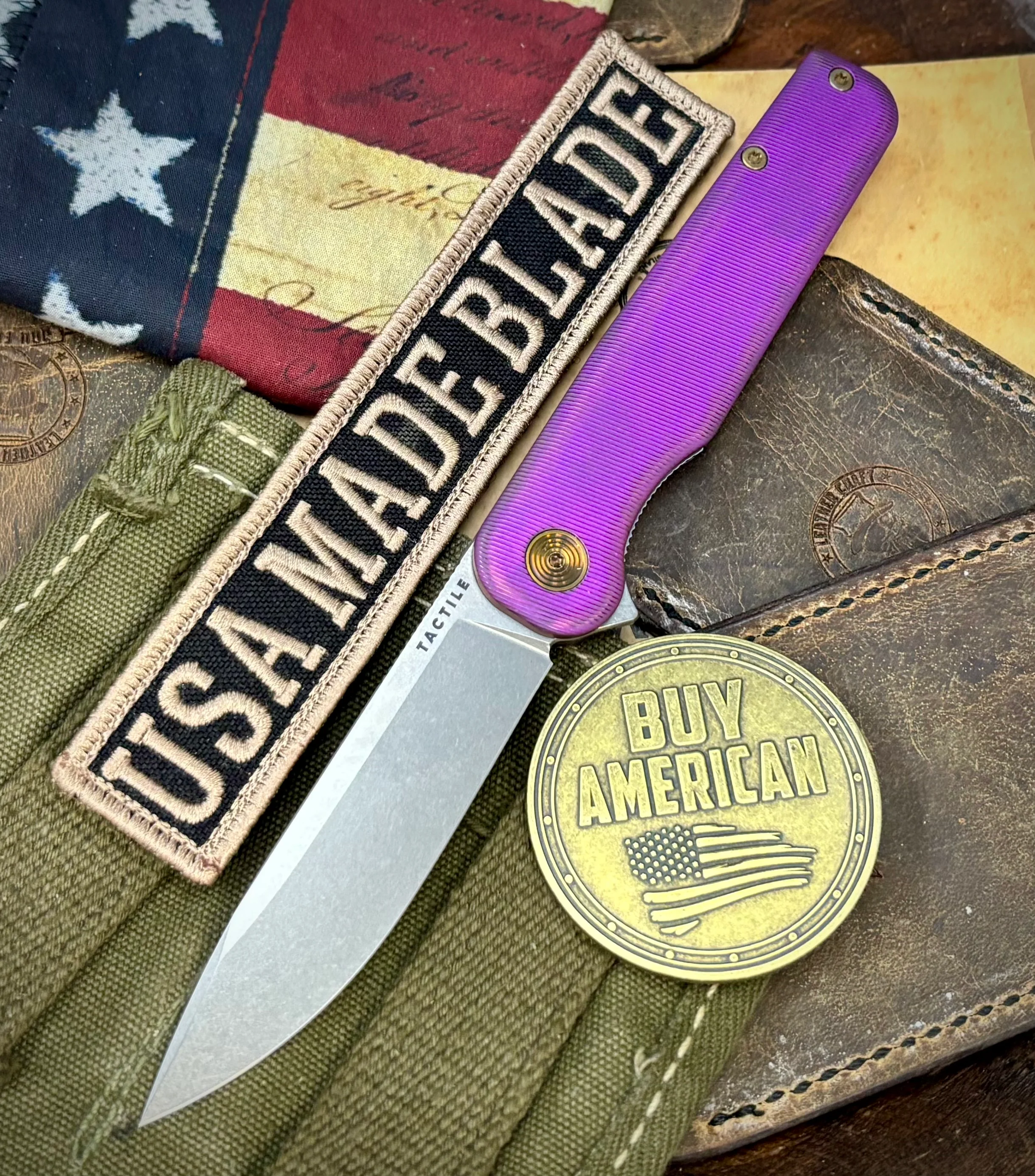 High Res Slate Purple Rockwall Flipper with Magnacut Blade Countoured Ti Handles with bronze ti hardware from Tactile Knife Co.