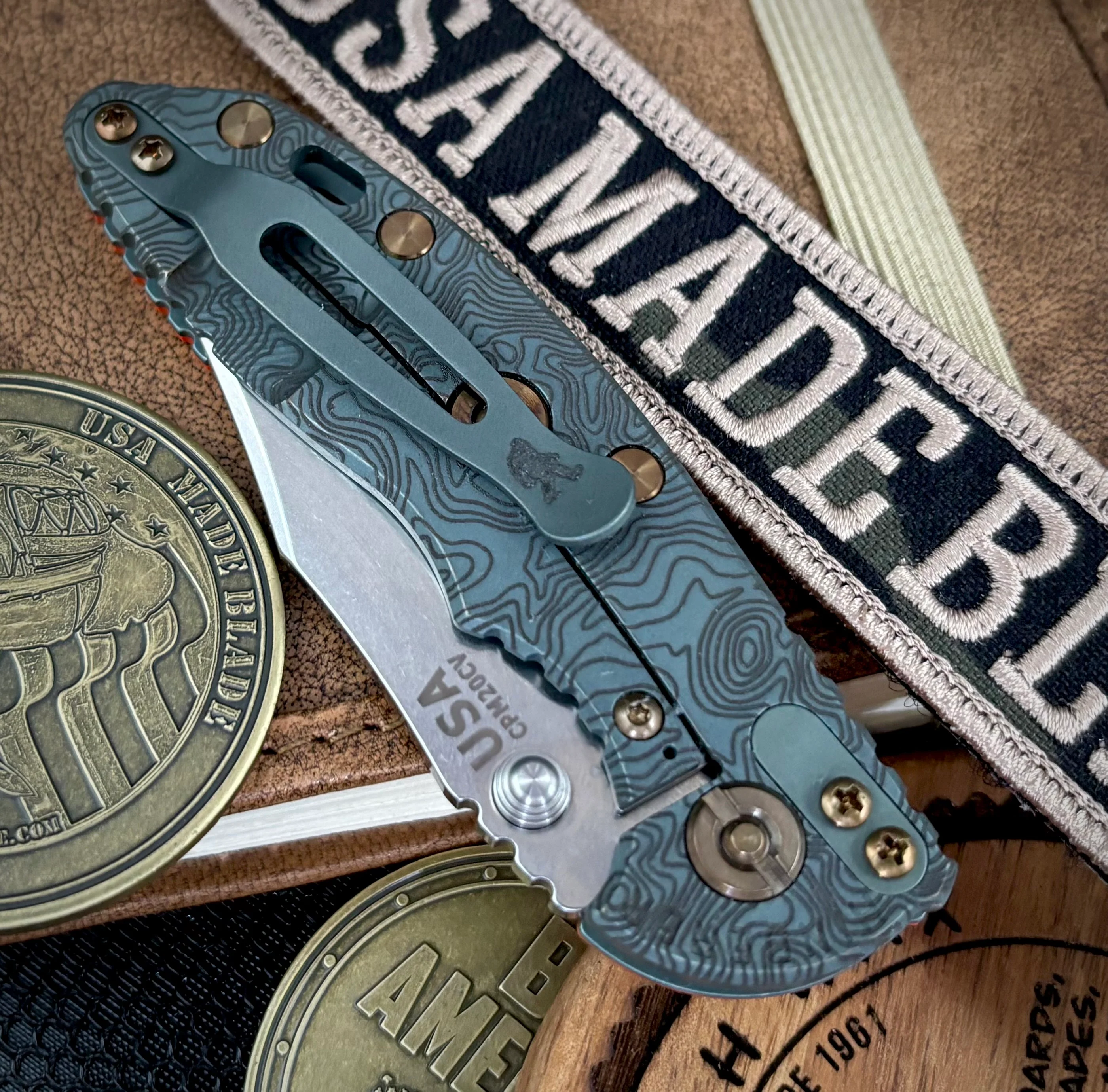 Topo Ammo Can Green Hinderer XM-18 3.0" Bowie Non-Flipper Orange G10 Anodized Working Finish Ti with Stonewashed 20CV Blade Bronzed Out Hardware and Sasquatch Clip - Image 3